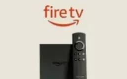 Fire TV Stick and its remote on a table